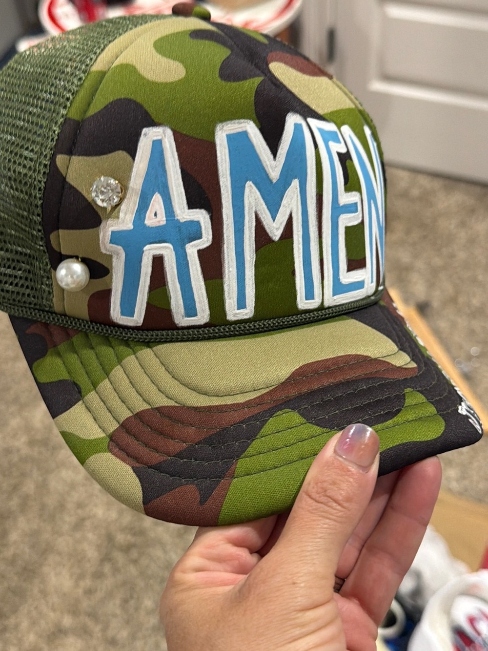 Camo Trucker Hat with Blue 'AMEN' Lettering